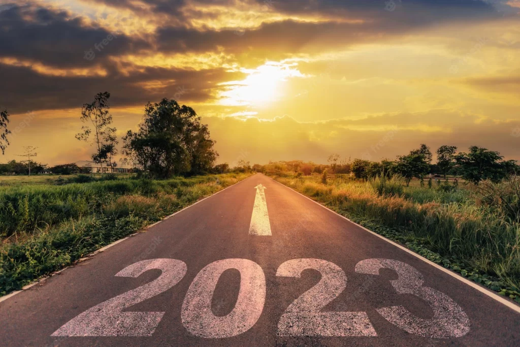 empty asphalt road new year 2023 concept driving empty road goals 2023 with sunset 1627 5260